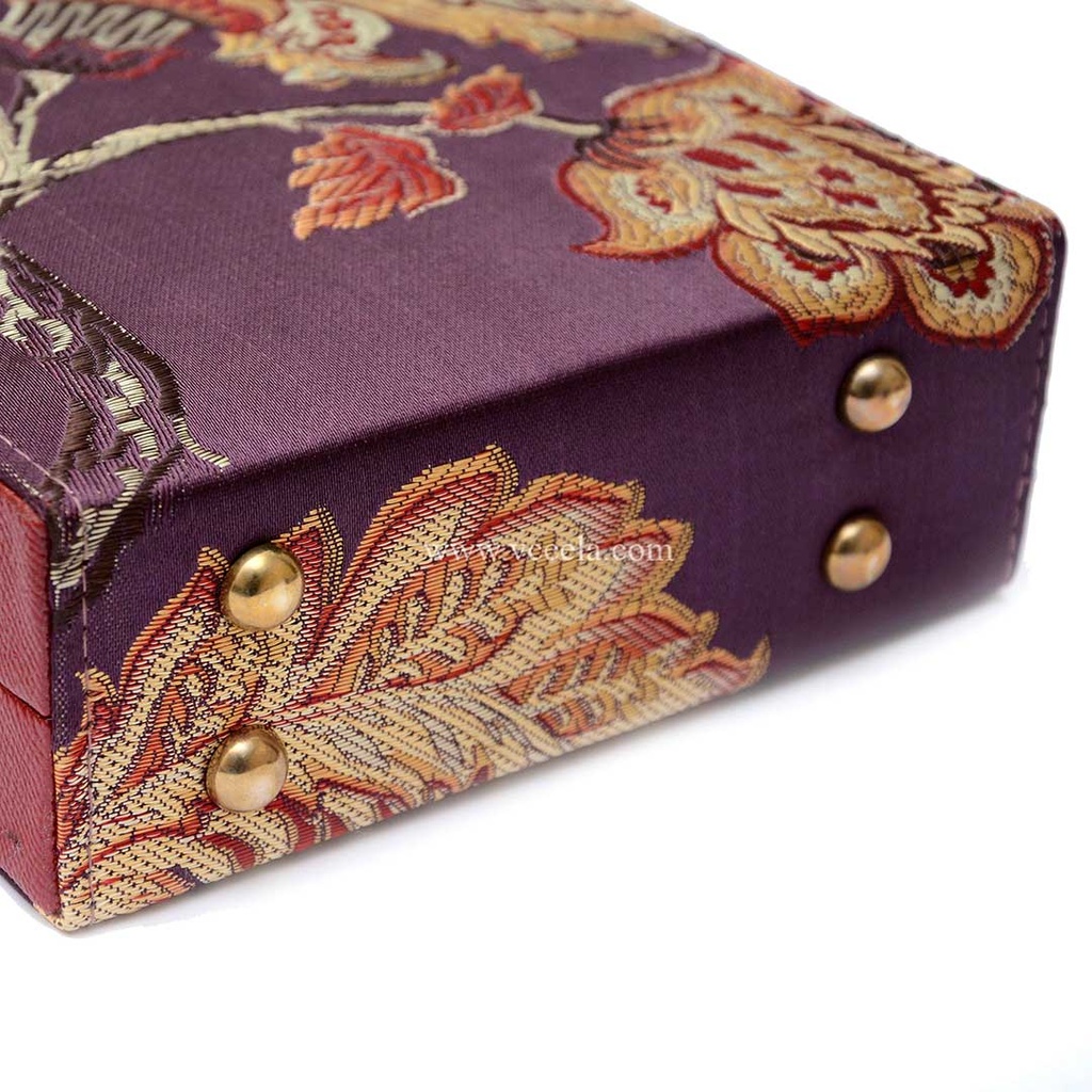 Hand embroidered clutch