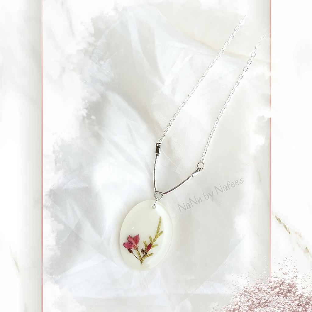 Sparkling silver dry jatropha flowers  resin pendant
